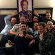 Former World of Warcraft developer Alex Afrasiabi and other current and former Blizzard developers allegedly posing with a portrait of Bill Cosby at BlizzCon 2013.